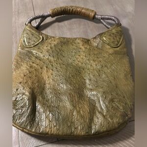 100 ostrich made purse made in Italy in mint good condition